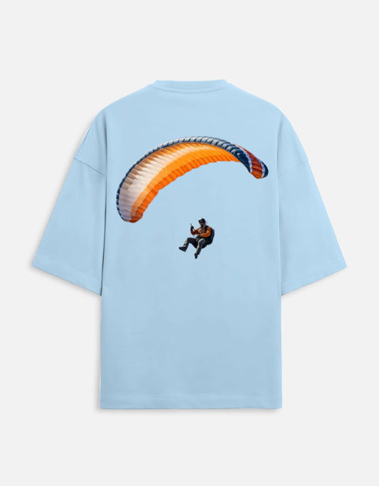 baby blue unisex terry oversized travel t-shirt with para gliding graphic design