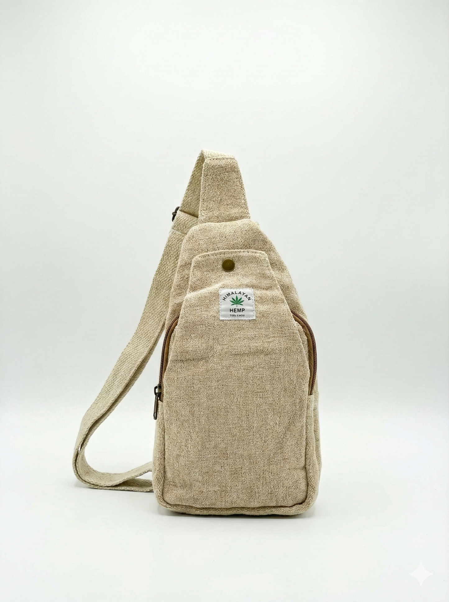 Handcrafted Himalayan hemp crossbody bag featuring natural fabric texture, front zipper pocket, and adjustable shoulder strap for travel.