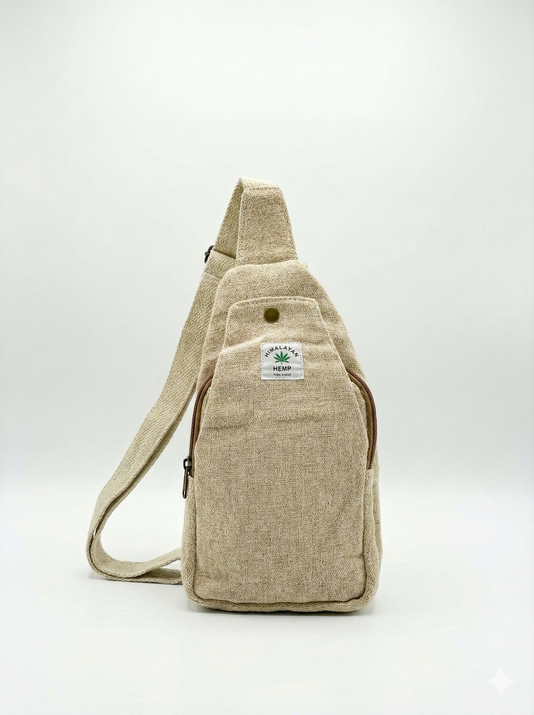 Handcrafted Himalayan hemp crossbody bag featuring natural fabric texture, front zipper pocket, and adjustable shoulder strap for travel.