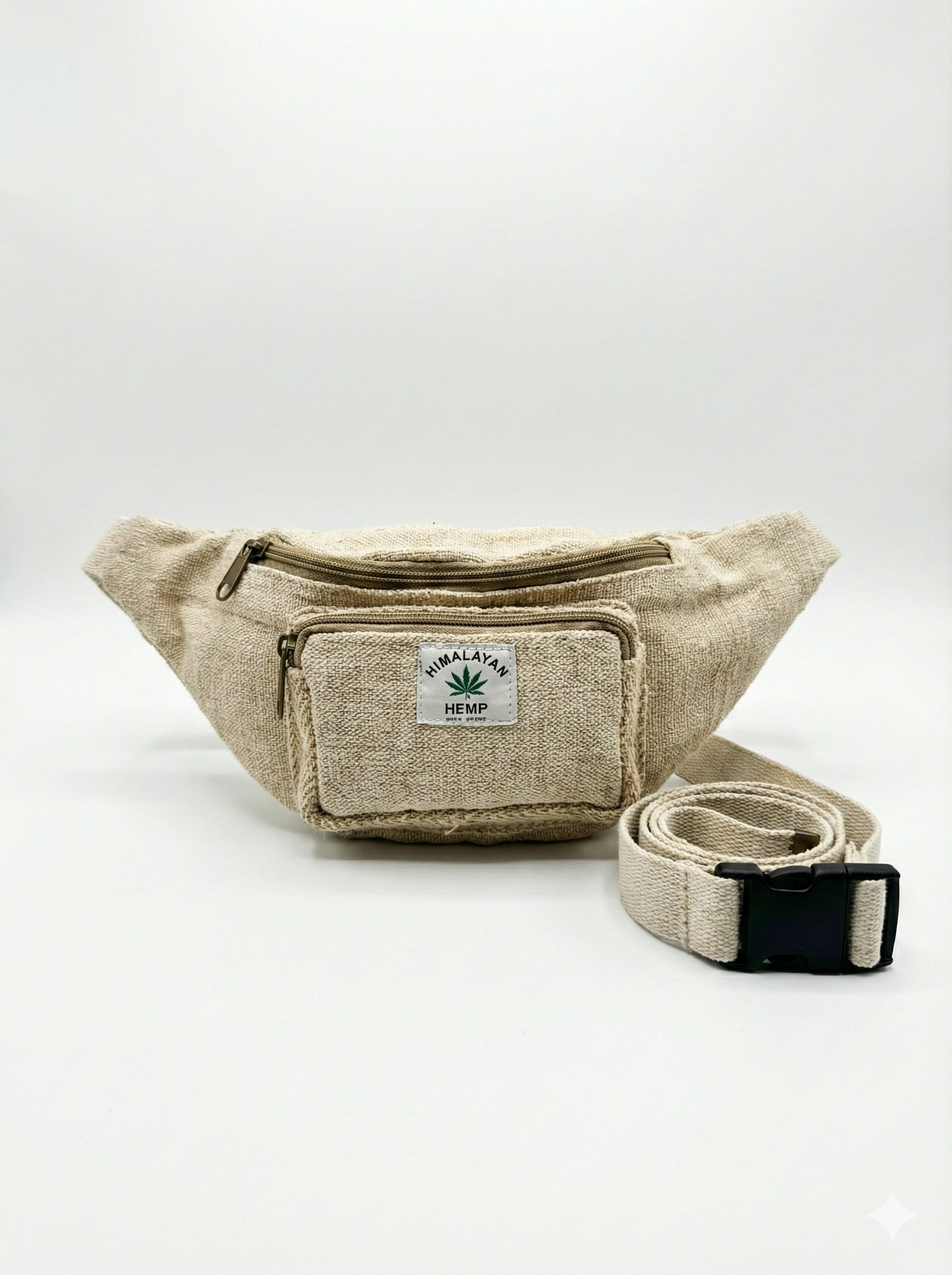 Handcrafted Himalayan hemp waist bag in natural beige with zippered front pocket and adjustable buckle strap for travel and outdoor use.