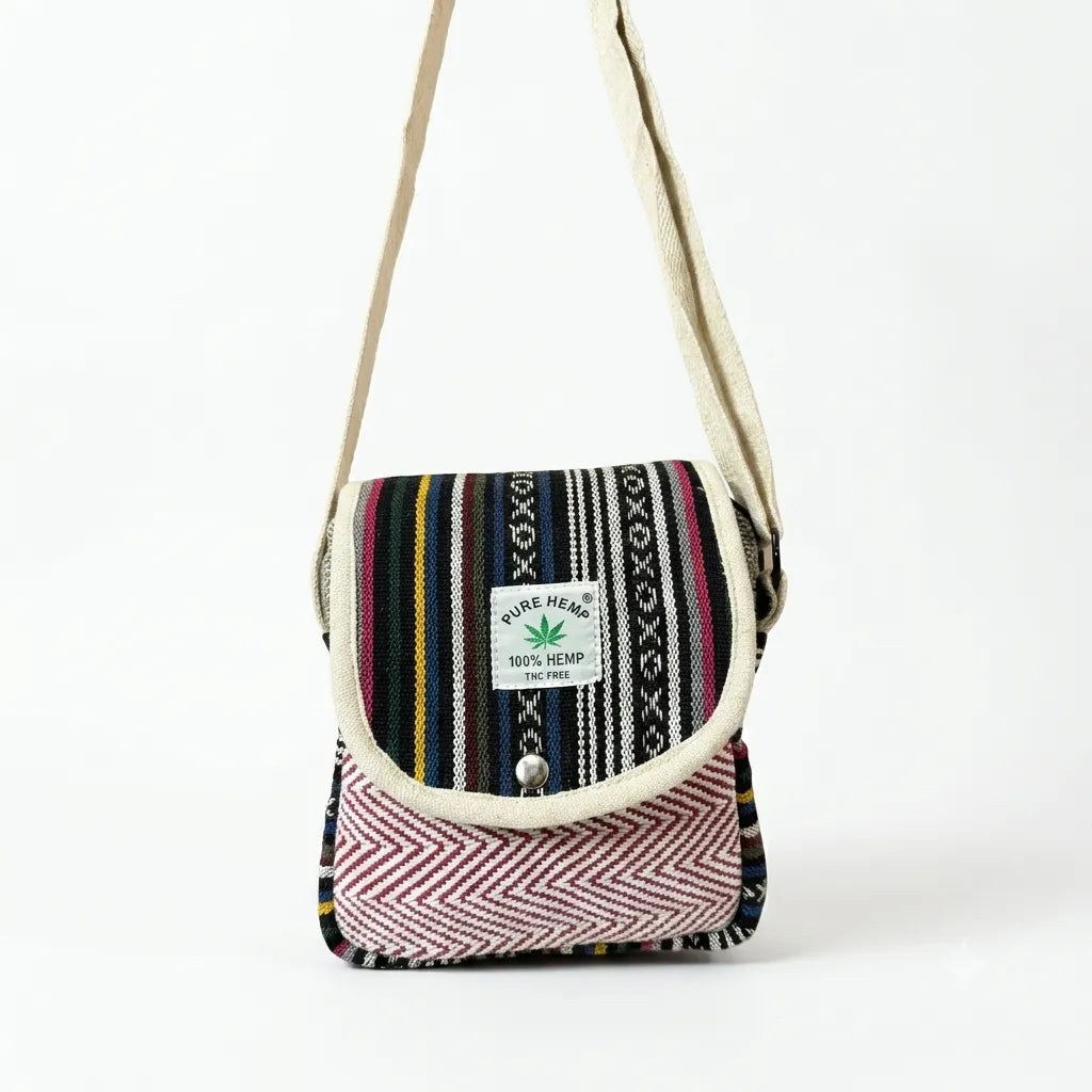 Khojo Yatra hemp sling bag with the flap open, showing the natural beige inner flap and zippered main compartment