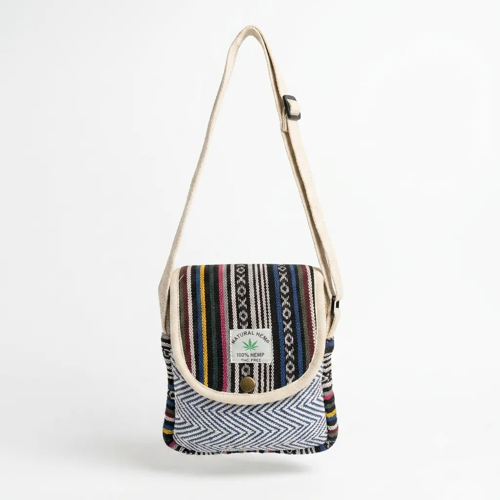 Blue-and-white chevron woven front pocket and multicolour geometric detailing on the Khojo Yatra hemp sling bag