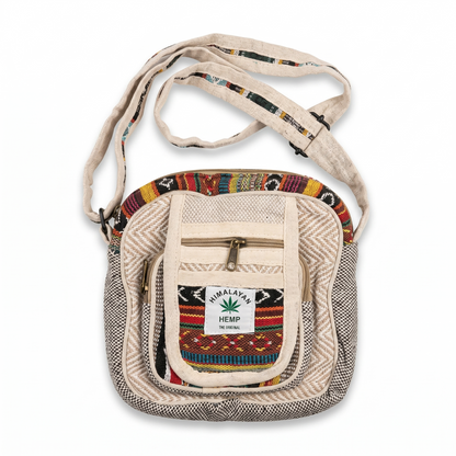 Multicolor hemp sling bag with adjustable strap, front zipper pocket, woven pattern, and Himalayan hemp label