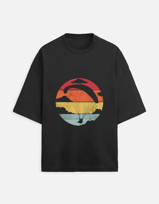 black unisex terry oversized travel t-shirt with gliding graphic design
